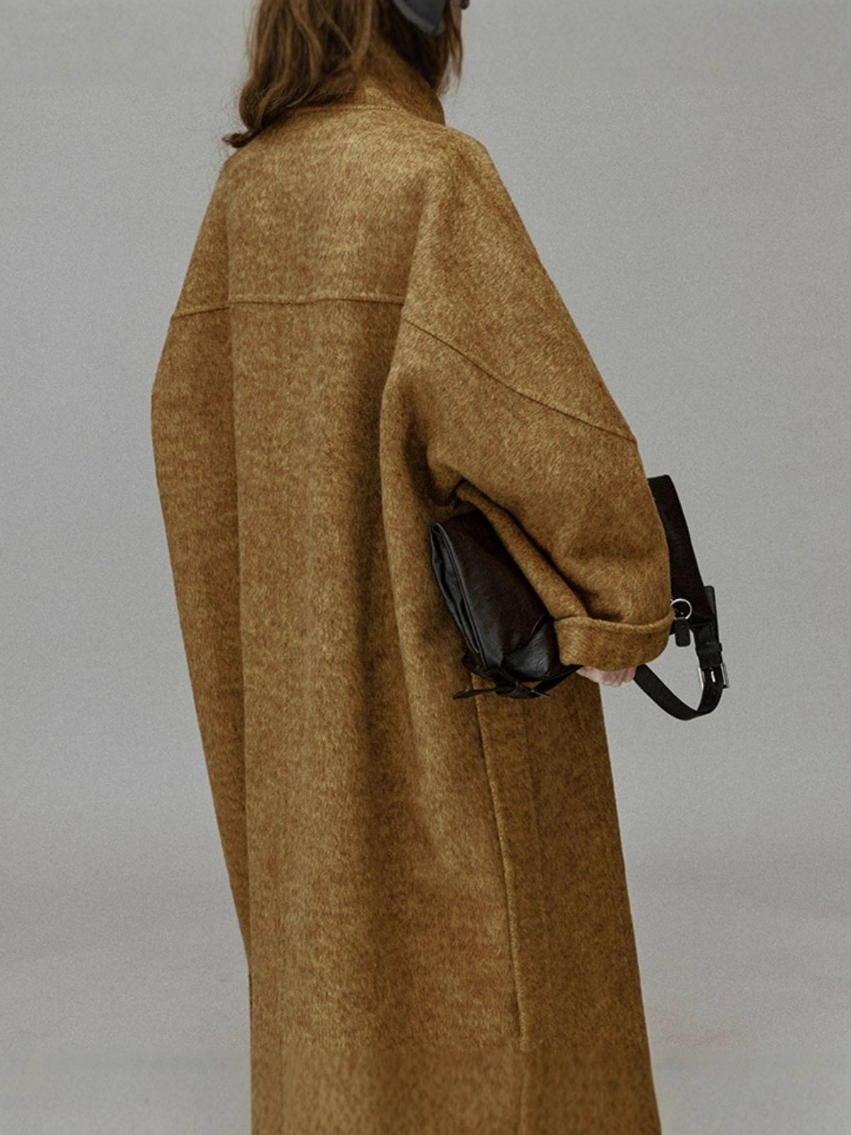 Brown long wool coat back view with stand collar, button details, wide dropped sleeves
