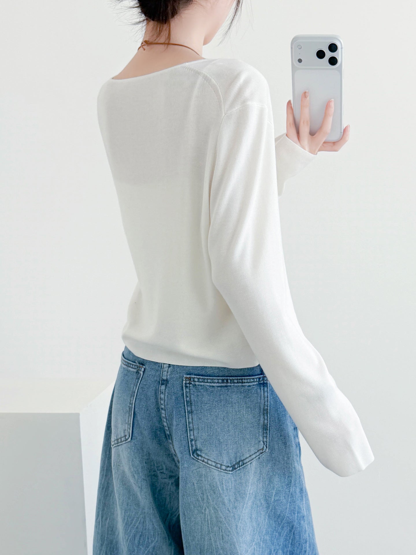 V-neck cropped cardigan for women, lightweight long sleeves, back view, white