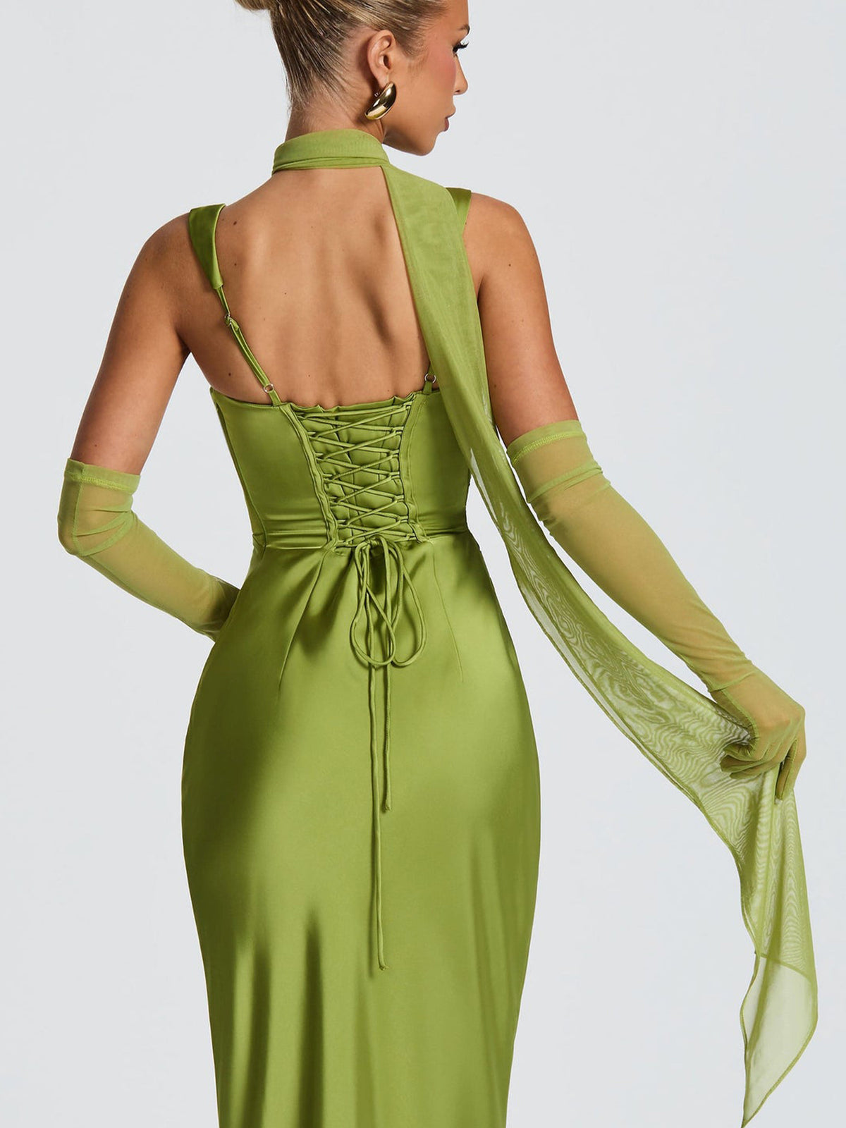 Green satin backless spaghetti strap dress with crisscross ruching and tied drawcord