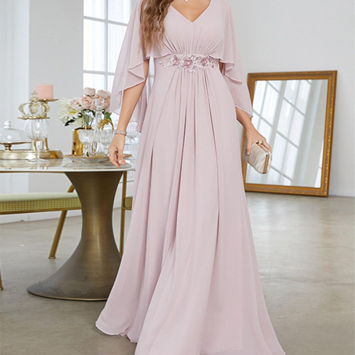 Light pink V-neck evening dress with cape sleeves, ruched waist and sequin applique