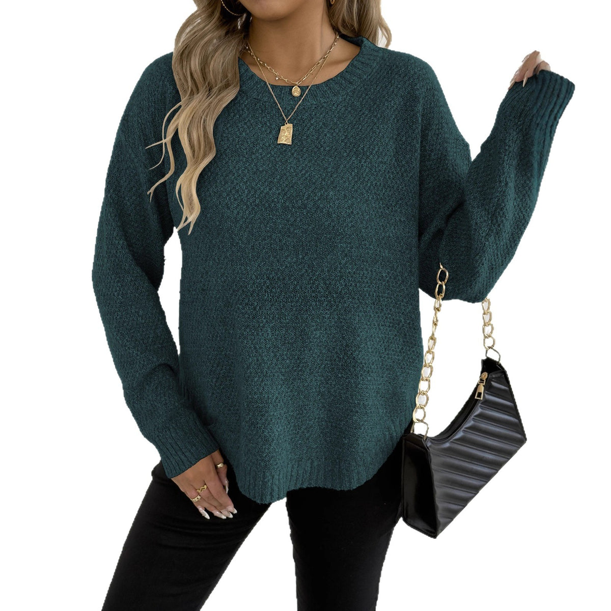 Dark teal knit pullover sweater with round neckline and long sleeves