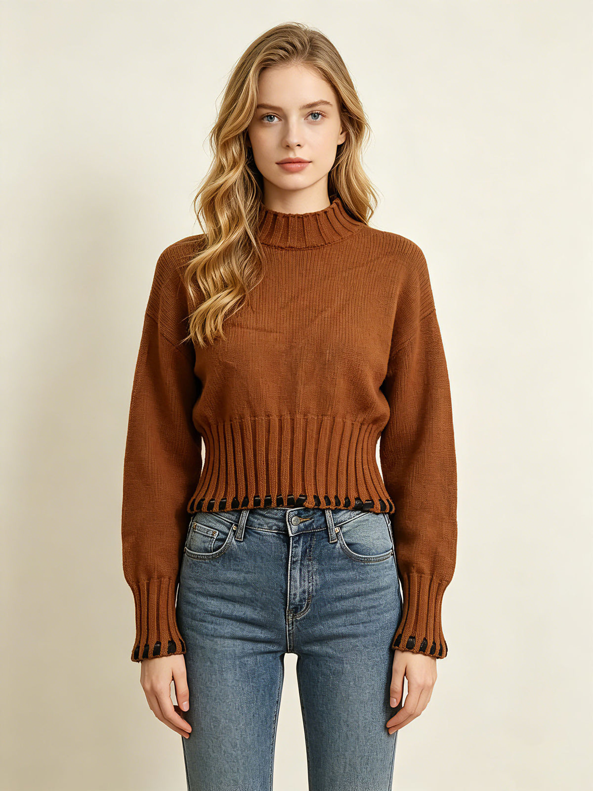 Women’s caramel short knit sweater with half turtleneck, ribbed cuffs, and textured hem