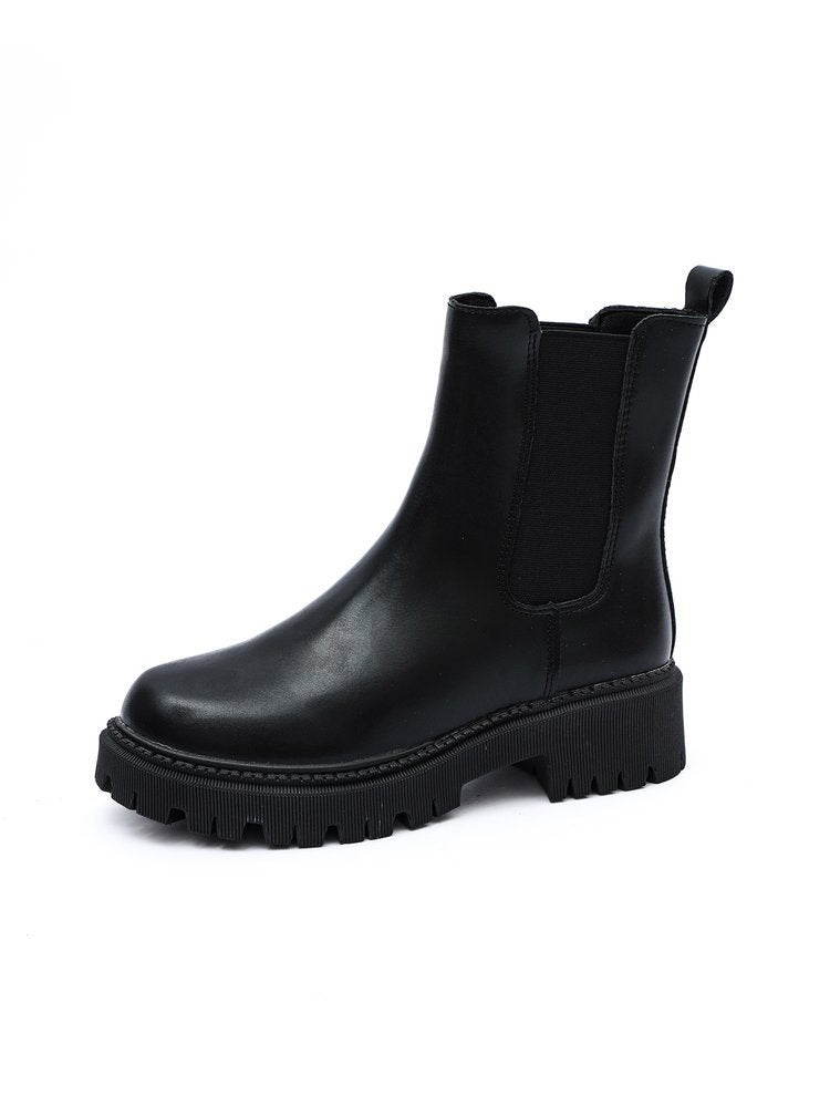 Women's black Chelsea ankle boots with elastic side gore and chunky outsole
