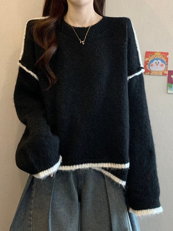 Black knit sweater with striped hem and cuffs, relaxed fit