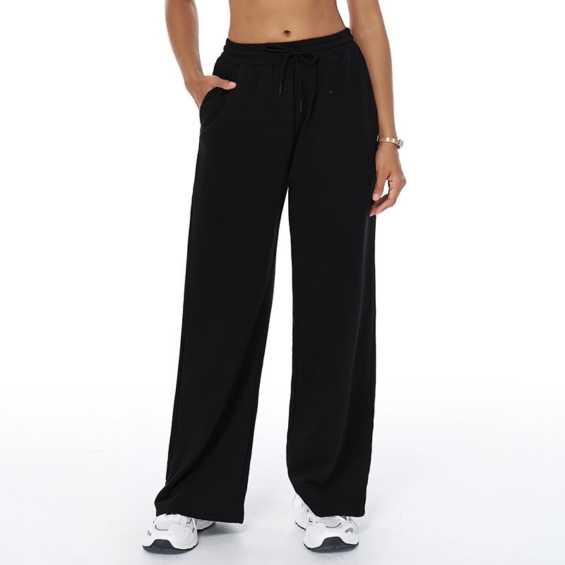 High-waisted loose sweatpants with straight legs, drawstring waist, black