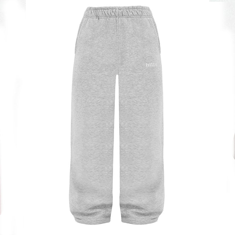 Light gray sweatpants with elastic waistband and relaxed wide-leg fit