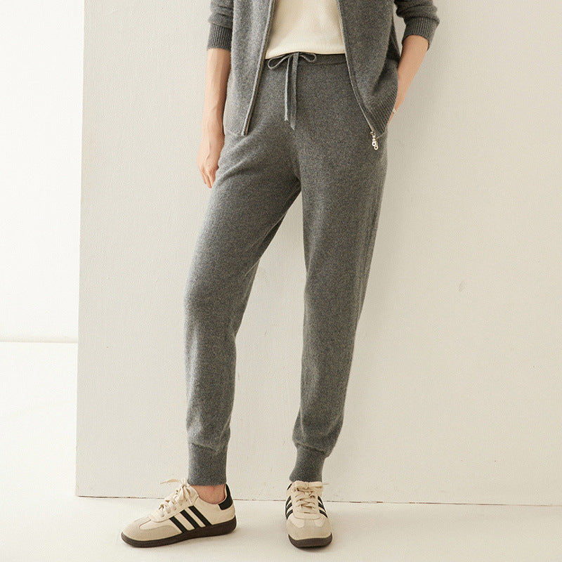 Grey cashmere-knit jogger pants with drawstring waist and tapered slim legs