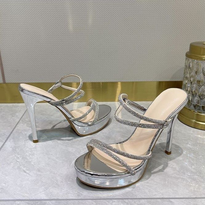 Silver rhinestone platform strappy heeled sandals with thin stiletto heels, ankle strap