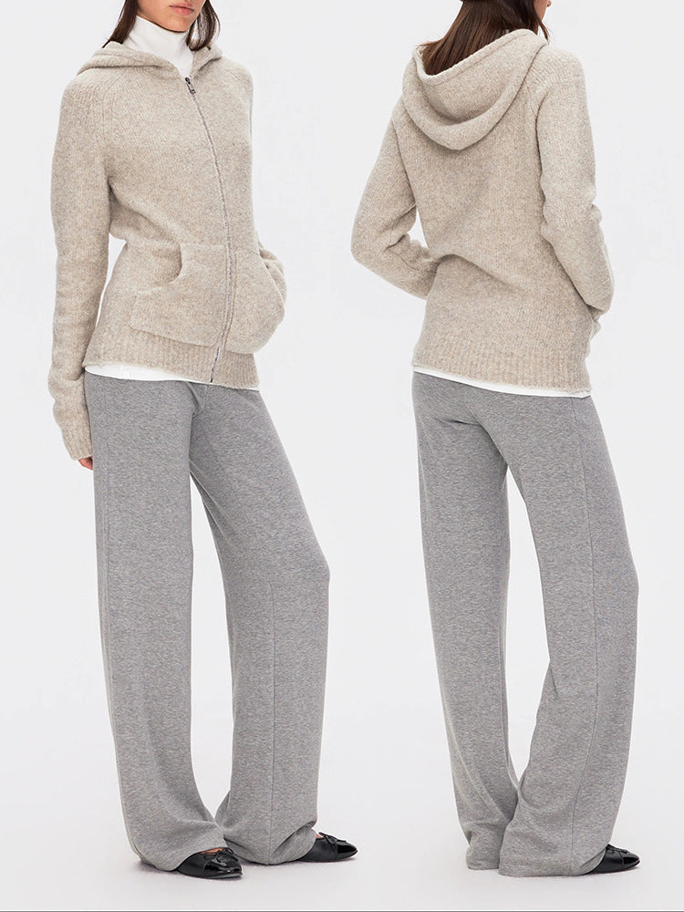 Women’s beige zip-front knit hoodie sweater with hood, long sleeves, and front pocket