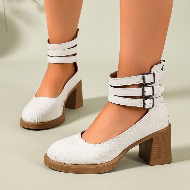 White textured platform pumps with wide ankle strap and square block heel
