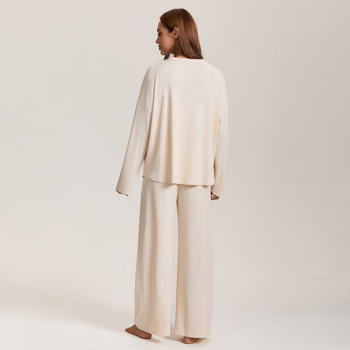 Women’s cream pajama three-piece set, back view, with lounge jacket and wide-leg pants