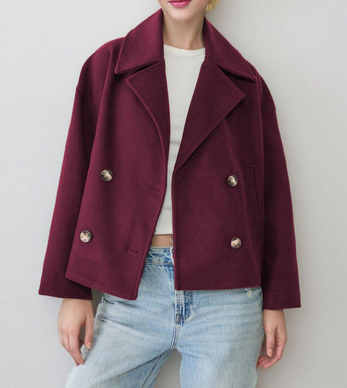 Women’s maroon double-breasted short wool jacket with lapel and silver button closures