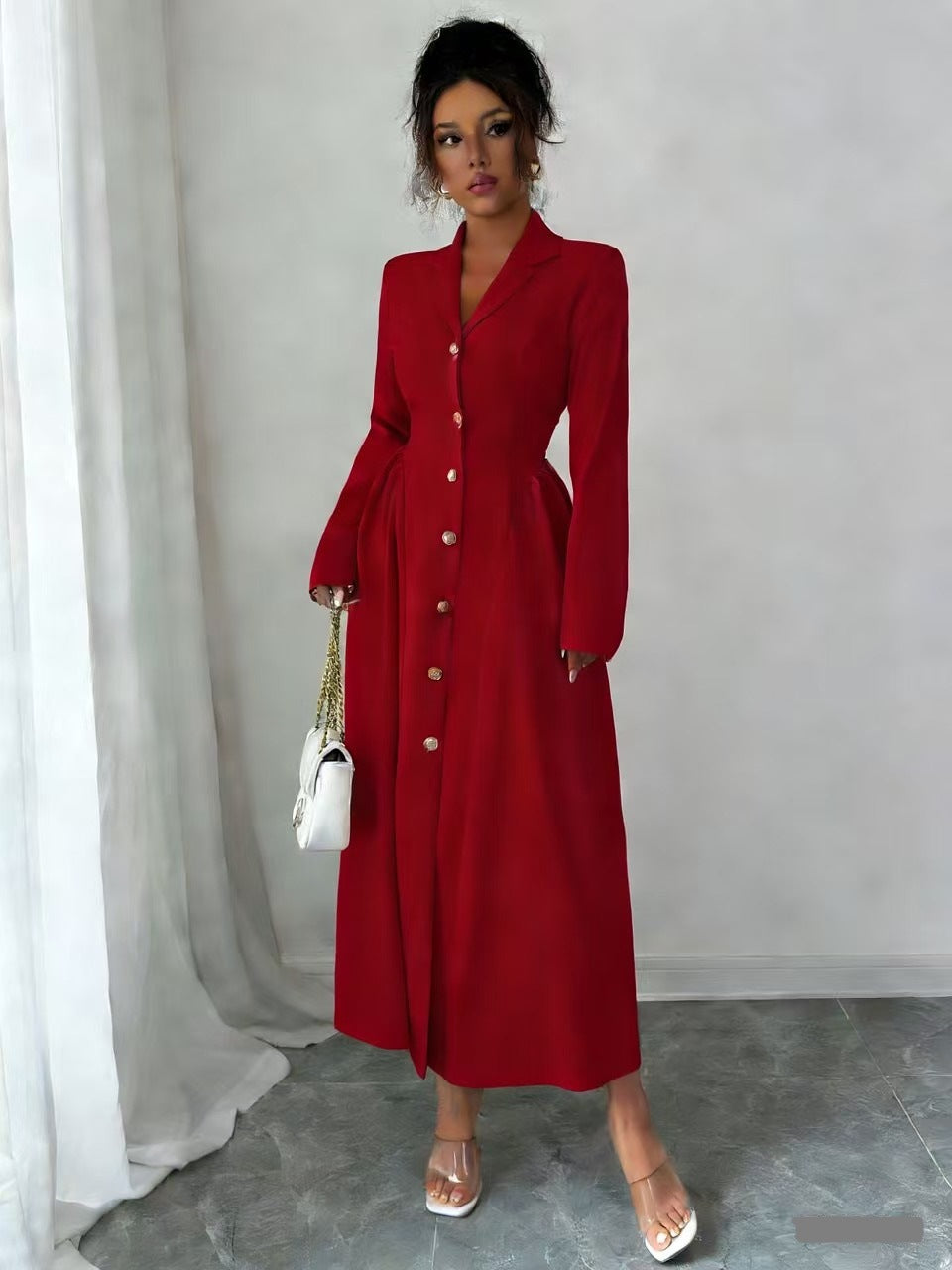 Red V-neck long-sleeve button-front dress with fitted waist, over-the-knee length