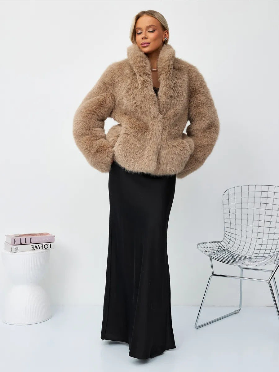 Beige faux fur mid-length coat with open shawl collar and side pockets