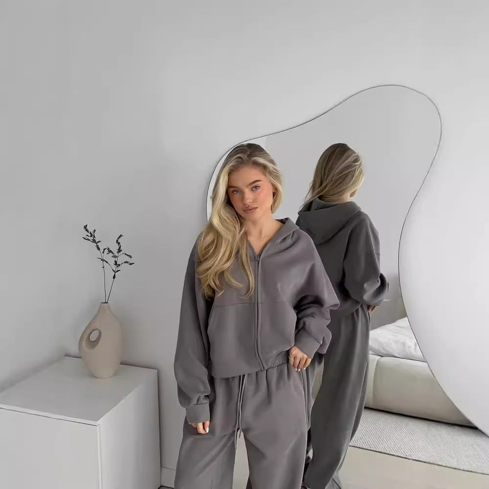 Women's gray zip-hooded jacket and jogger pants set with side pockets and cuffs