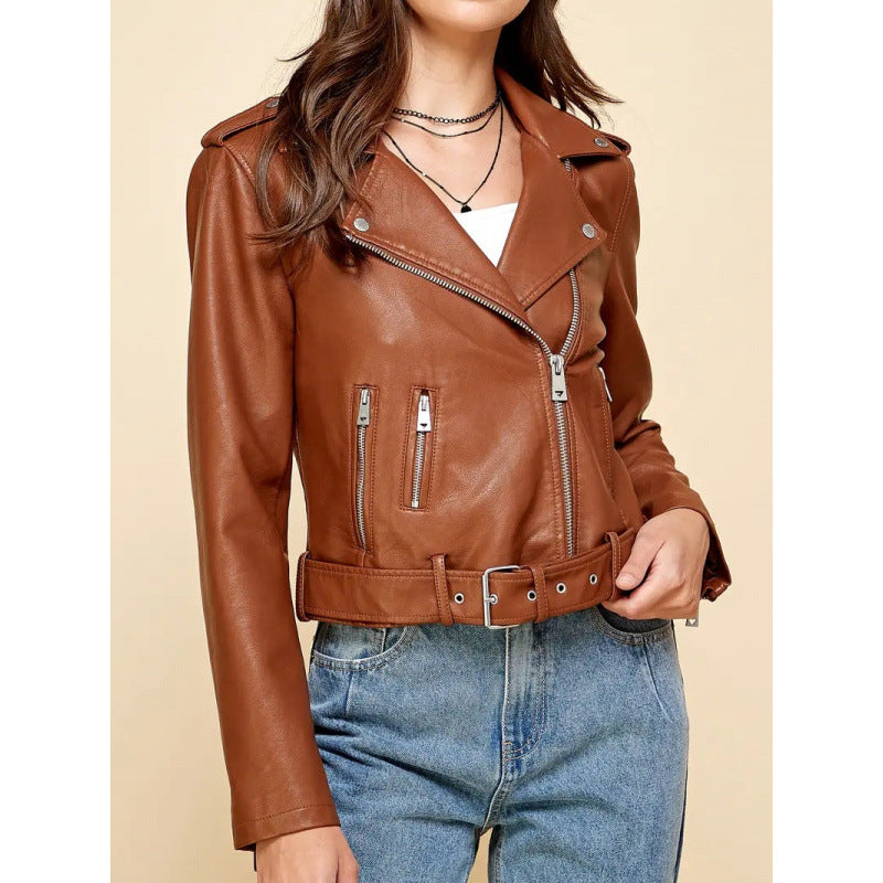 Women's short PU leather jacket in tan brown, zip-front with side zippers and belt