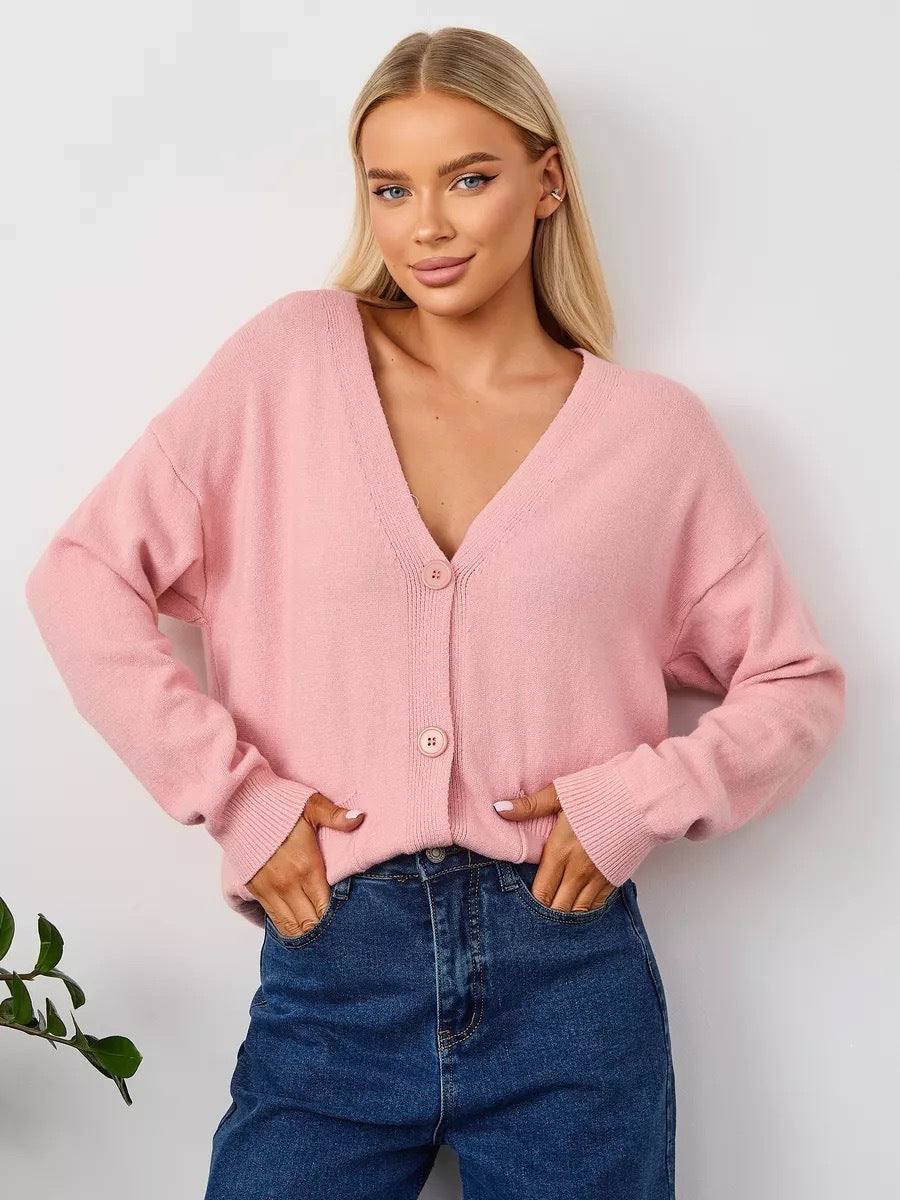 Women's pink knit V-neck cardigan with button front and front pockets, long sleeves