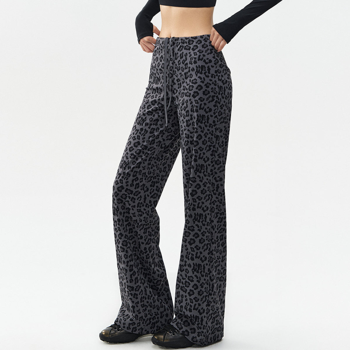 Women’s gray leopard-print wide-leg leggings with dark spots and drawstring waist.