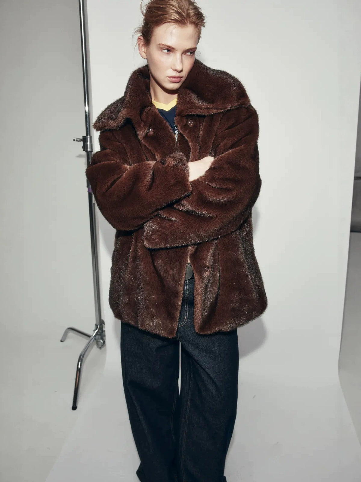 Wine-brown faux fur coat with wide lapel, button front, long sleeves