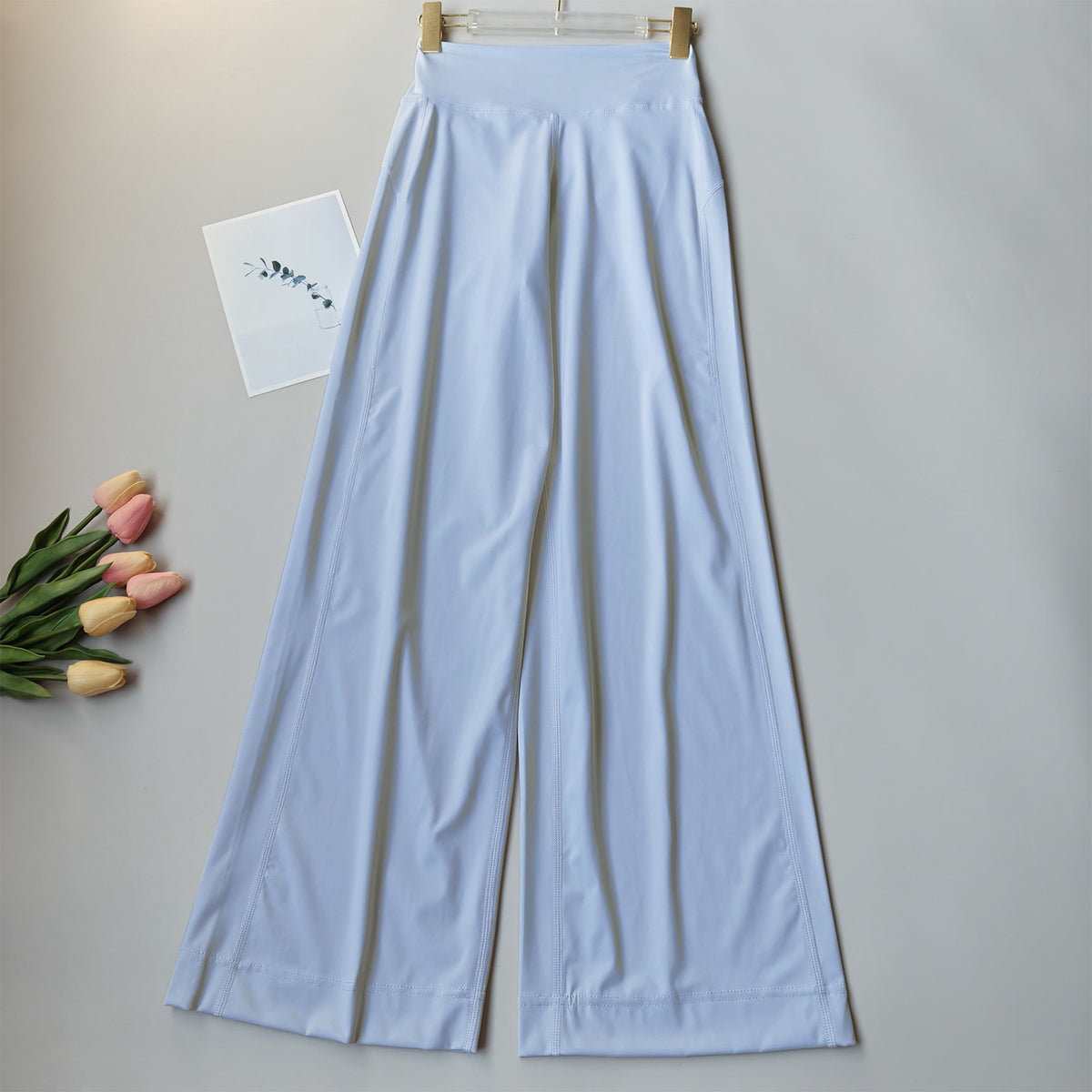 Light blue high-waisted wide-leg yoga pants, full-length relaxed drape
