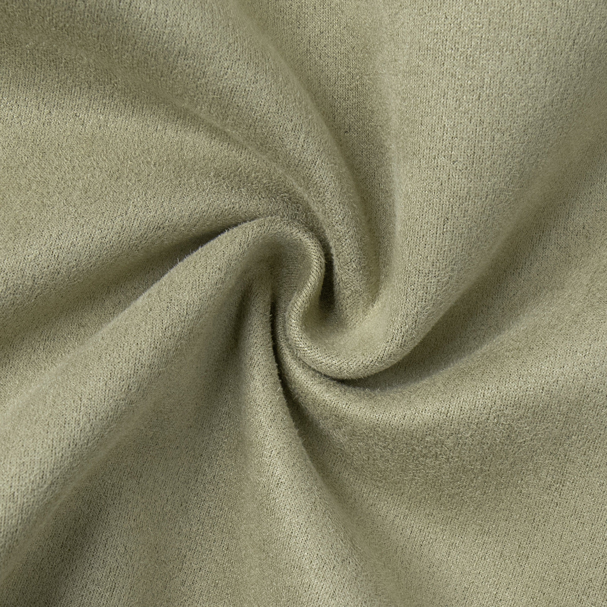 Olive suede fabric close-up with soft textured weave