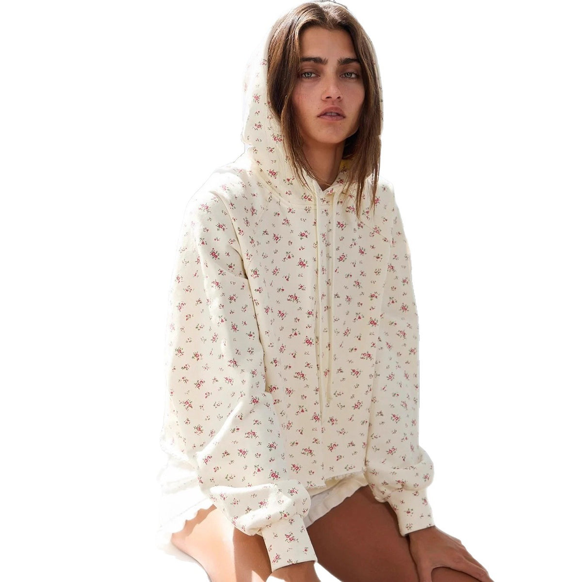 Apricot floral print pullover hoodie with hood, long sleeves, and ruffled hem