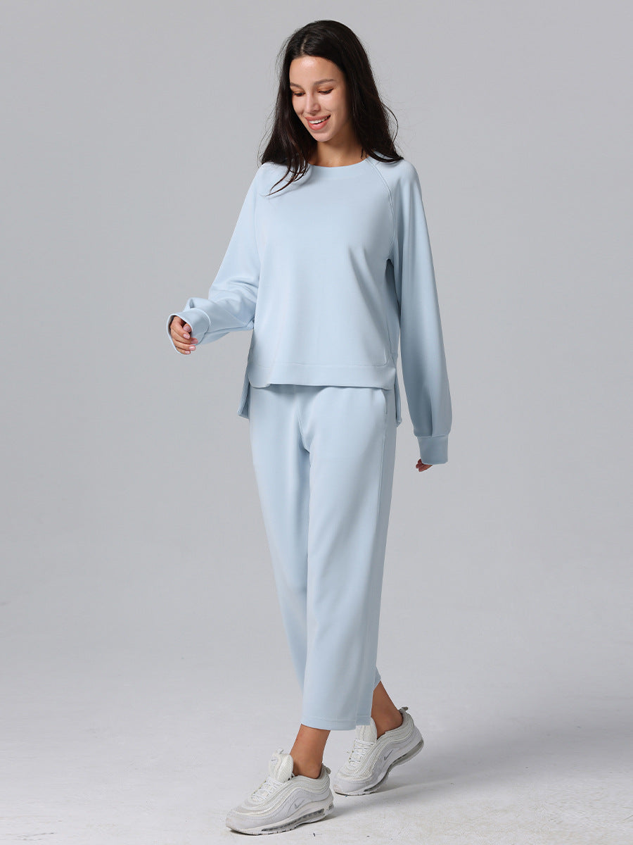 Light blue long-sleeved pullover with a relaxed fit and crew neckline