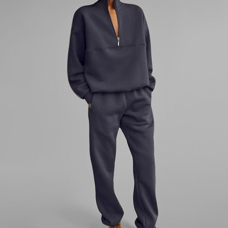 Navy blue zip-lapel two-piece tracksuit set with half-zip pullover and relaxed joggers