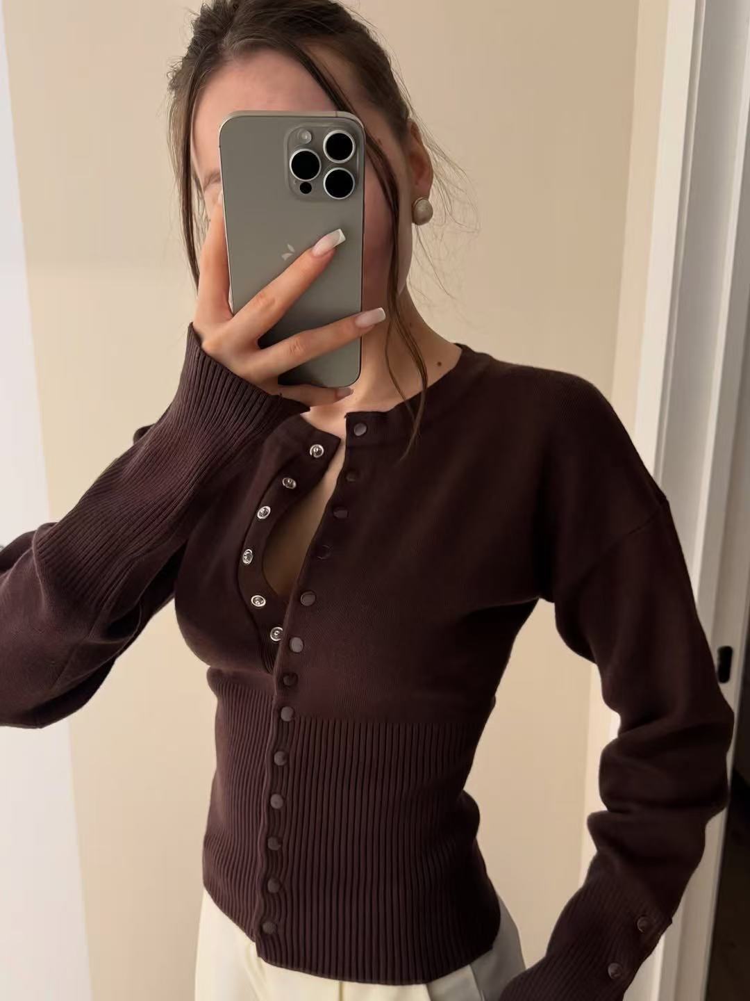 Women’s dark brown knitted cardigan sweater with button placket and long sleeves