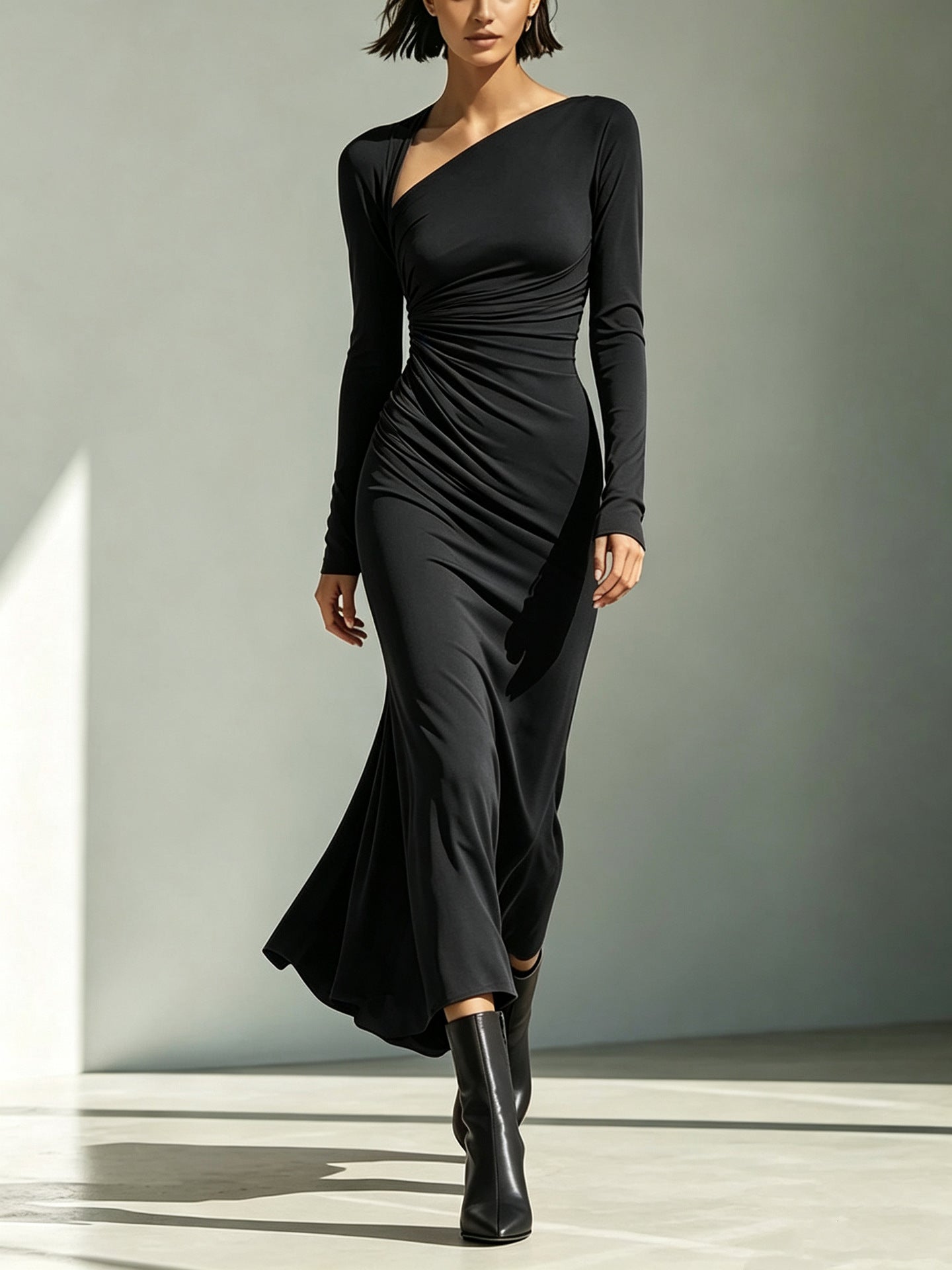 Black asymmetric maxi dress with long sleeves, ruched side drape, column silhouette