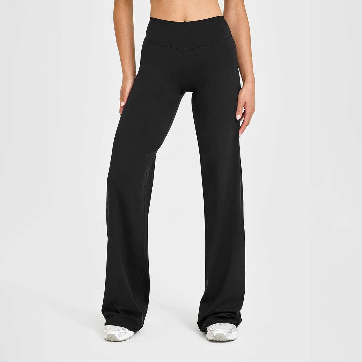 High-waisted straight-leg yoga pants in black, wide leg and smooth stretch fabric