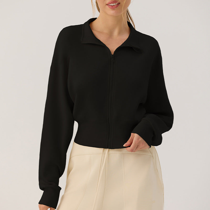 Black stand-up collar zip cardigan with loose lantern sleeves and cropped hem, front view.
