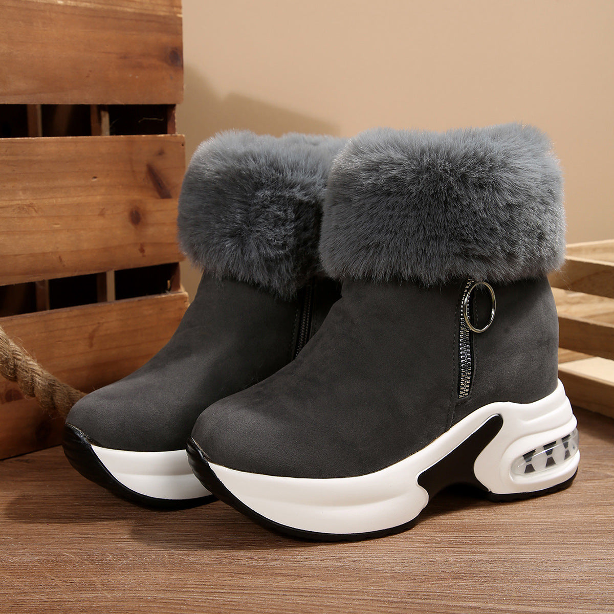 Dark gray fleece-lined snow boots with side zipper, faux-fur cuffs, chunky white platform sole