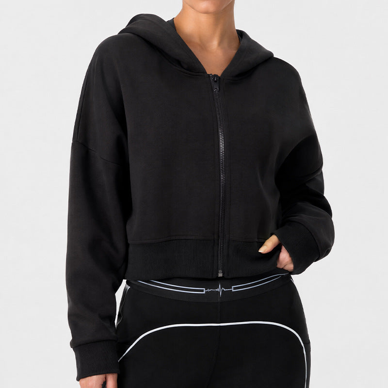 Black zip-up hooded cropped sports jacket with long sleeves and front pockets