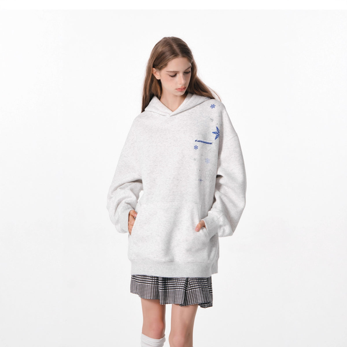 Light gray cotton hoodie with blue snowflake embroidery on chest and sleeves, hood down