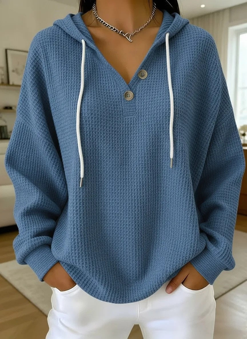 Women\u2019s waffle-knit drawstring hoodie with henley button placket, blue hood and long sleeves