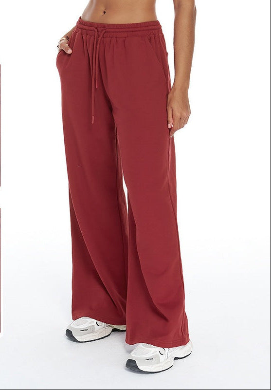 High-waisted loose sweatpants with straight legs, elastic drawstring waist, red
