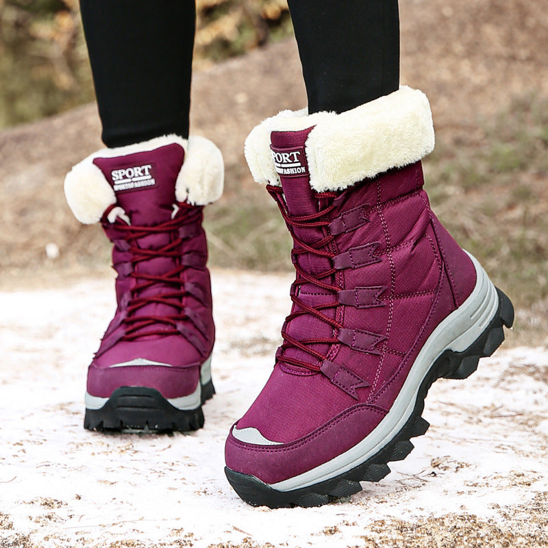 Burgundy lace-up winter boots with white fuzzy cuffs and thick grippy sole