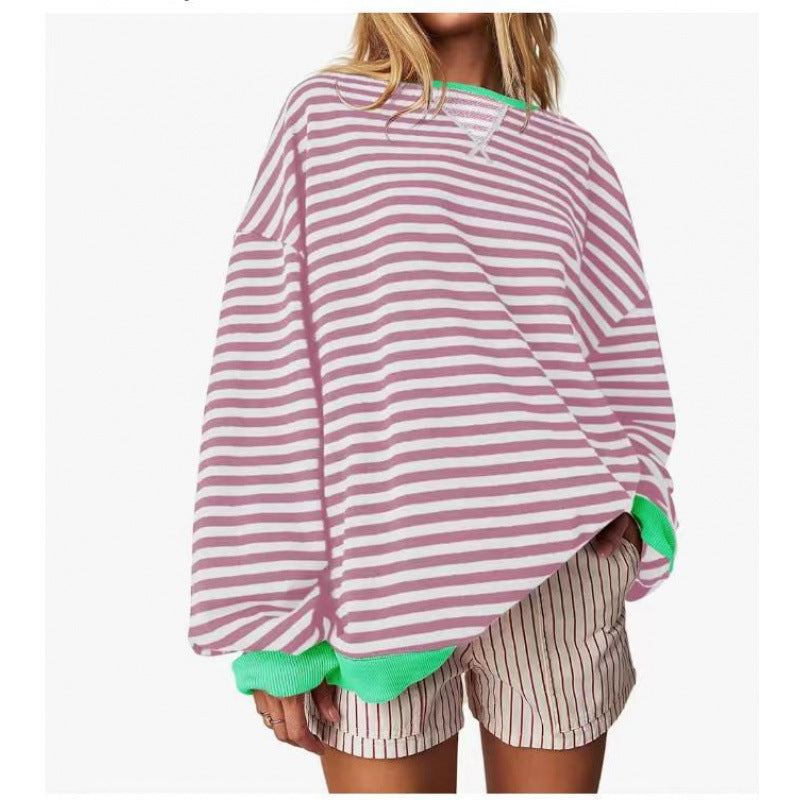 Women’s striped pullover sweatshirt with long sleeves and round neckline, light purple and pink.