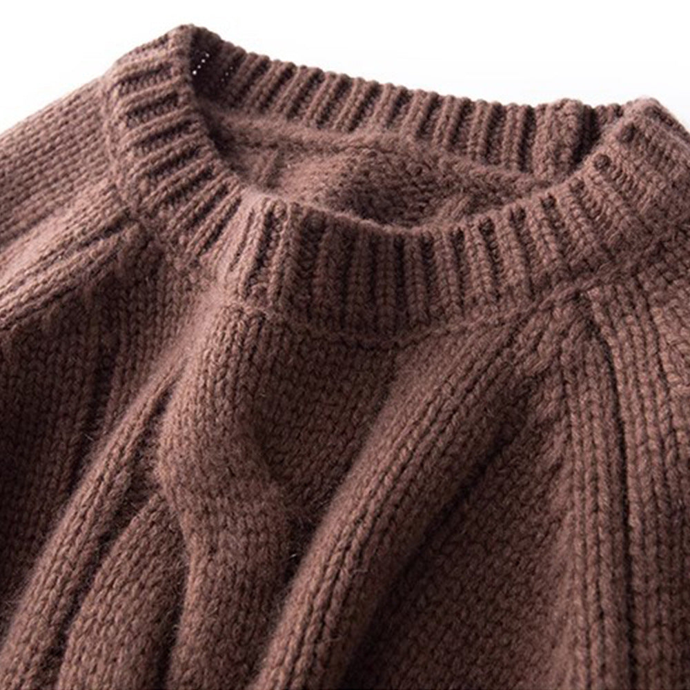 Brown chunky knit turtleneck top with vertical cable texture and ribbed collar.