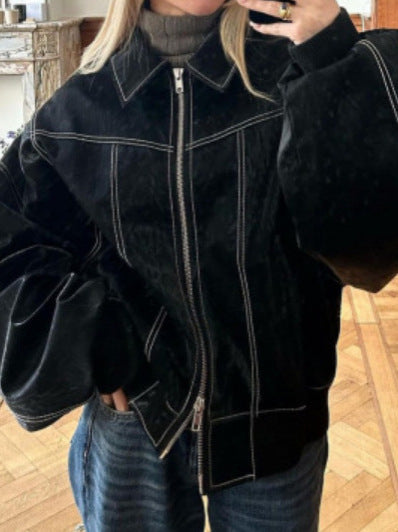 Black faux leather moto jacket with contrast stitching, zip front and raised collar
