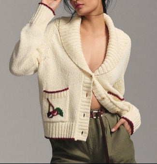 Beige knit sweater coat with lapel, button front, embroidered double pockets, long sleeves