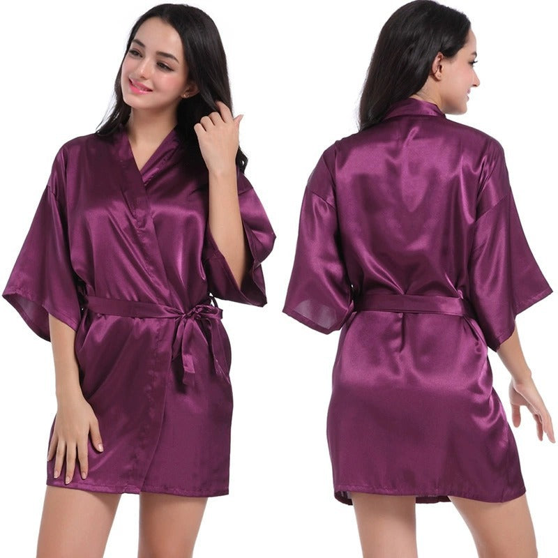 Purple satin short robe with V-neck and tied waist belt, half sleeves.