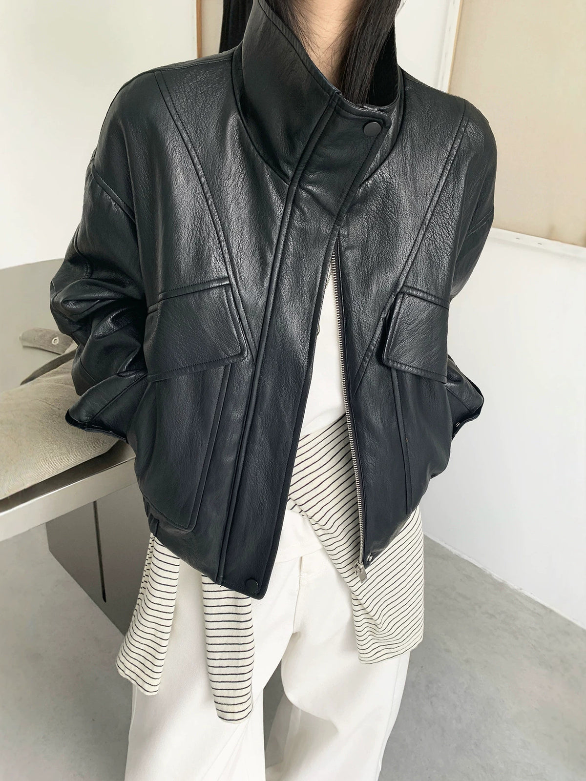 Black PU leather biker jacket with stand collar, zip front, shoulder seam panels