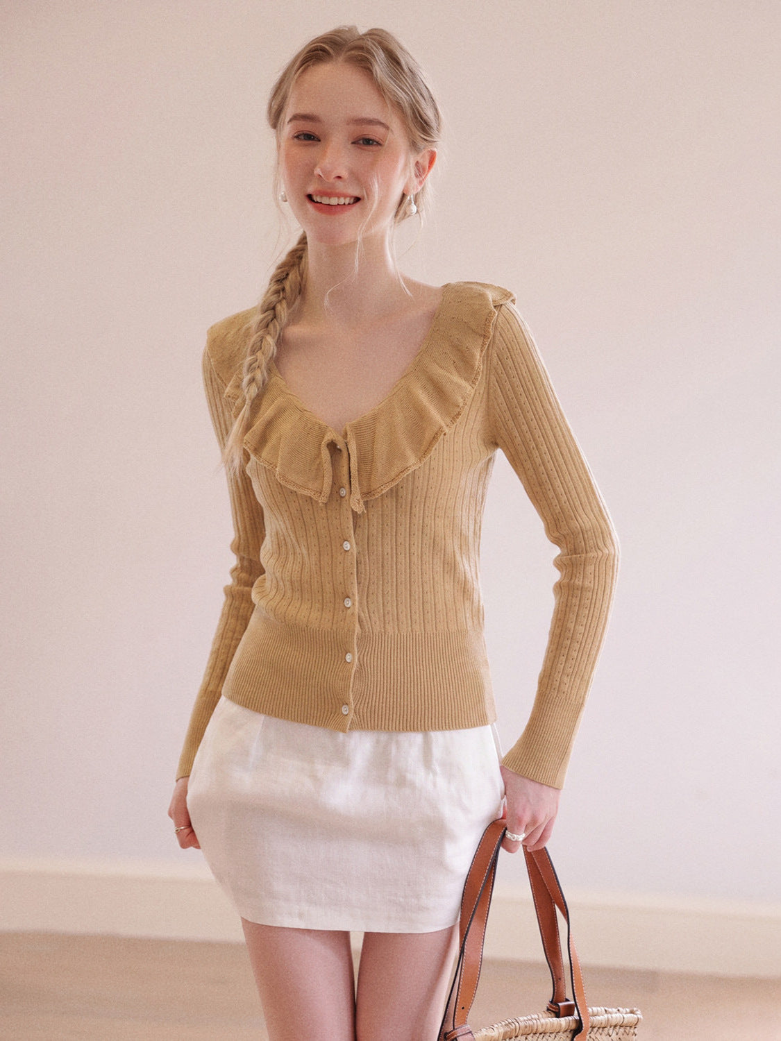 Camel brown long-sleeve knit V-neck button top with ruffled collar