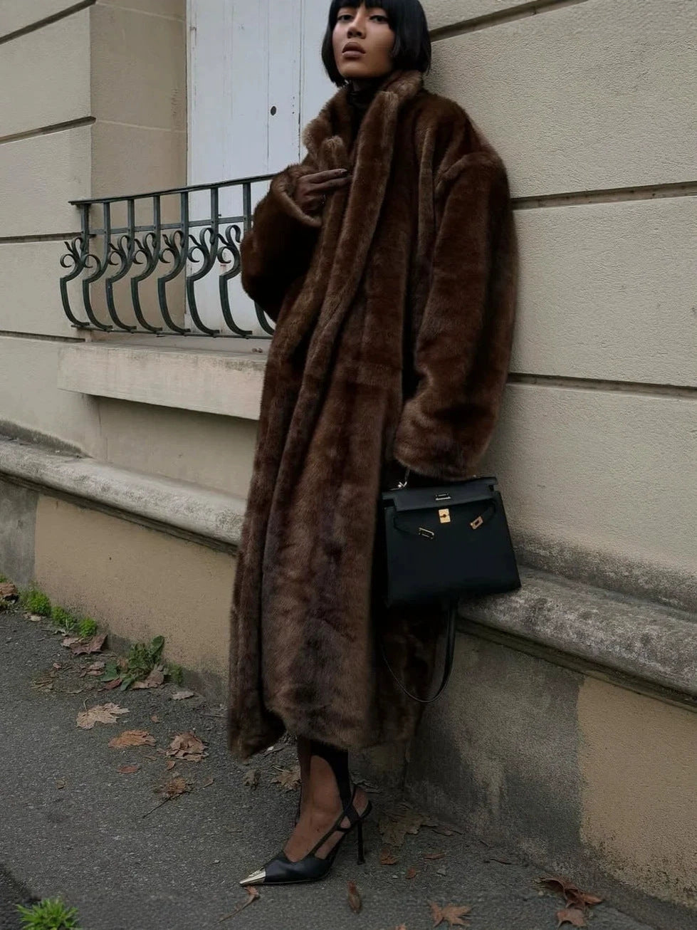 Dark brown faux fur long coat with stand collar and relaxed straight silhouette