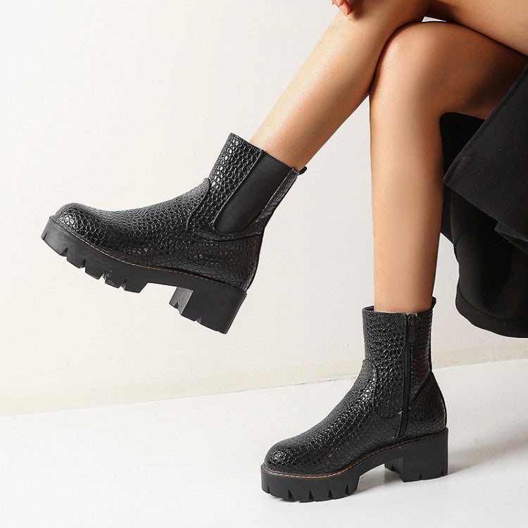 Black crocodile-pattern ankle boots with elastic panels and chunky lug soles