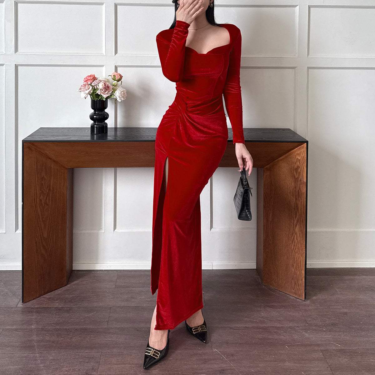 Red velvet fitted long-sleeve dress with square neckline and side slit