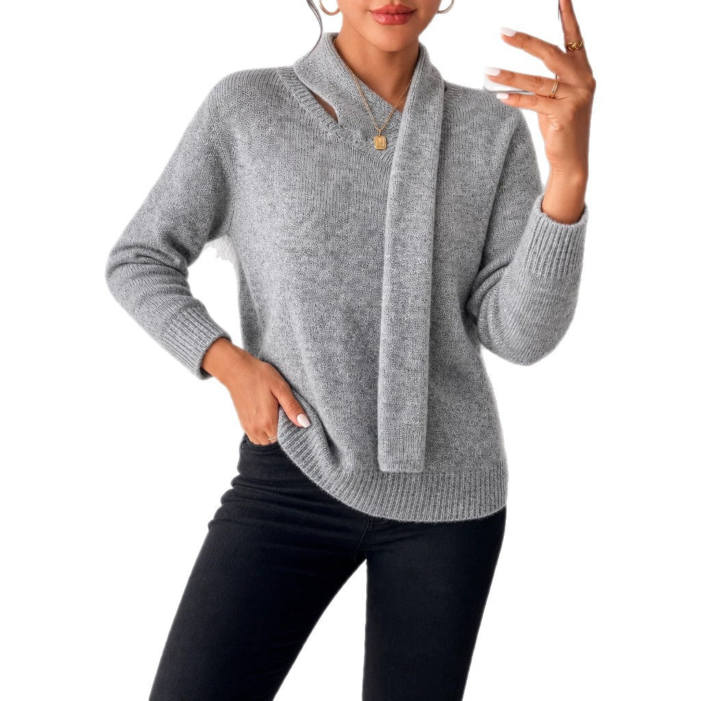 Gray knitted sweater with faux wrap V-neck, long sleeves, and ribbed cuffs