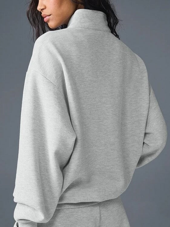 Gray half-zip pullover sweatshirt with stand collar, long sleeves, back view